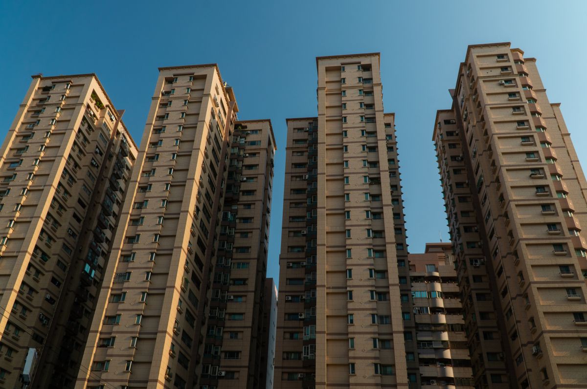 City apartment blocks against a clear sky